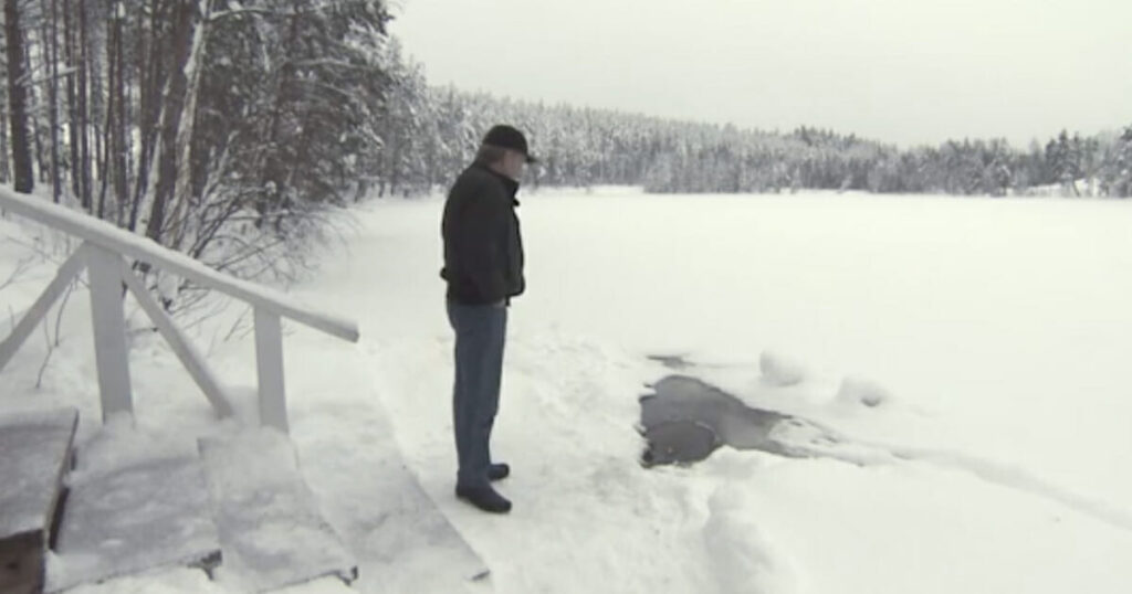The Daily Wait: Elderly Man Anticipates Daily Greeting from Friend Emerging from the Water