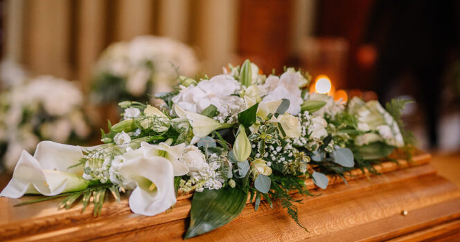 flowers on coffin