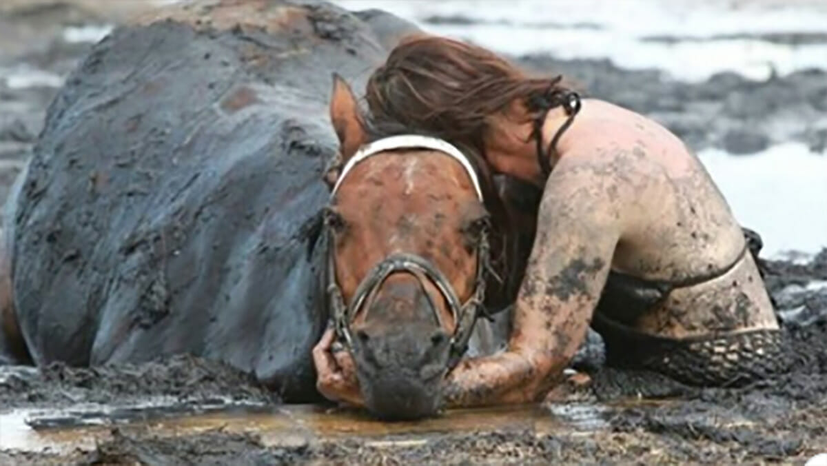 Desperate Damsel: Woman Clings to Horse for 3 Hours After It Gets Stuck in Mud